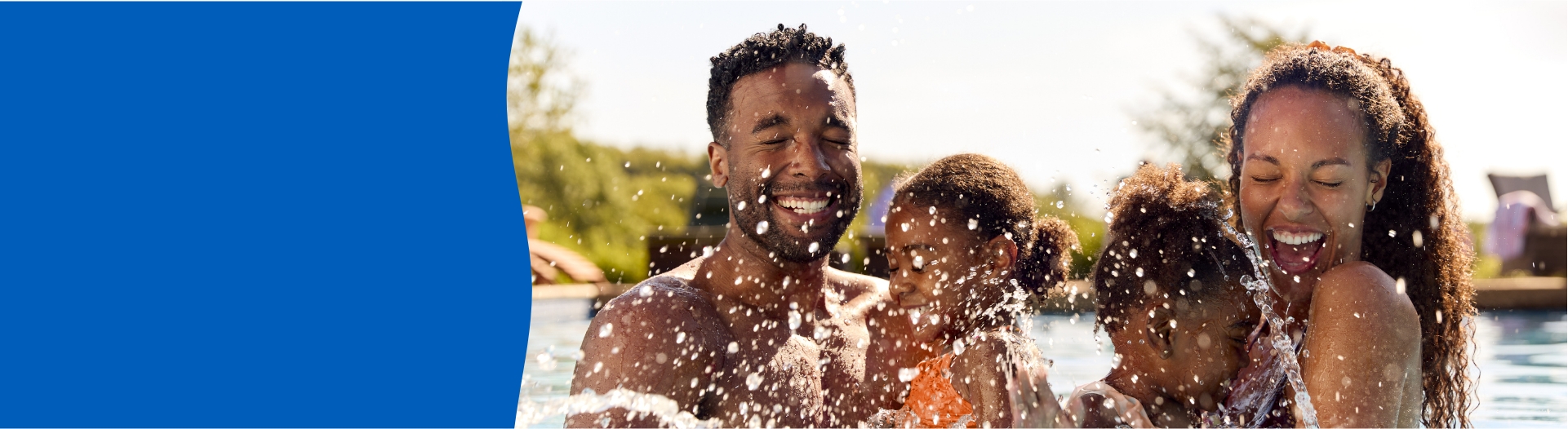 Family of 4 being splashed with water