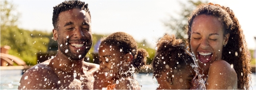 Family of 4 being splashed with water