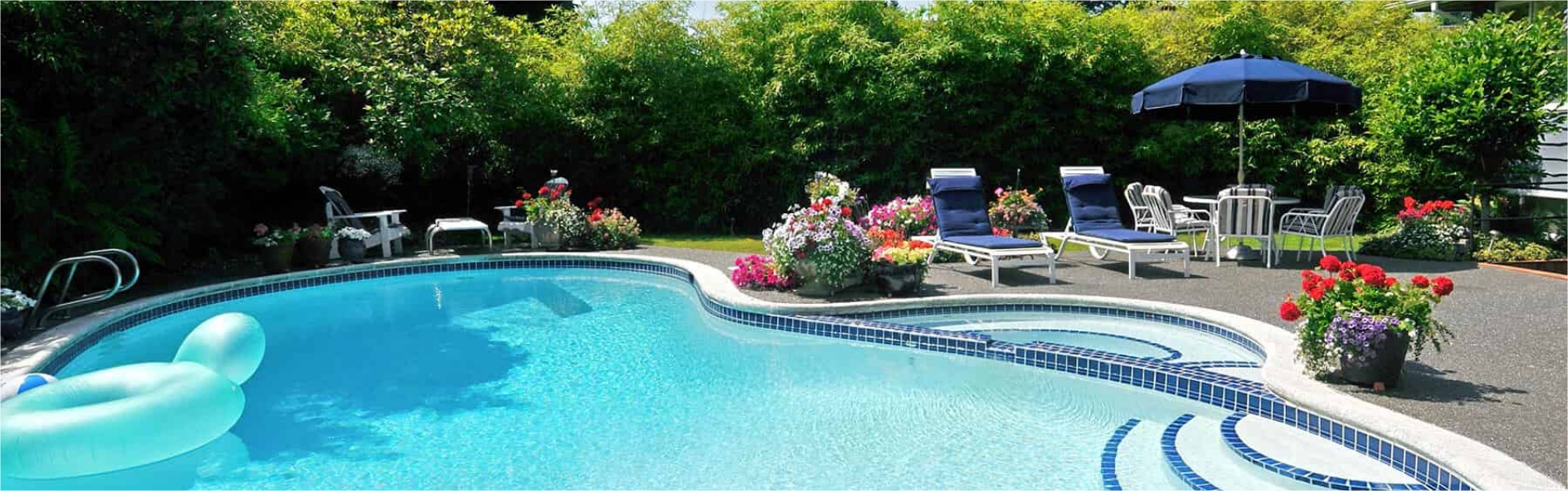 Backyard pool with patio furniture
