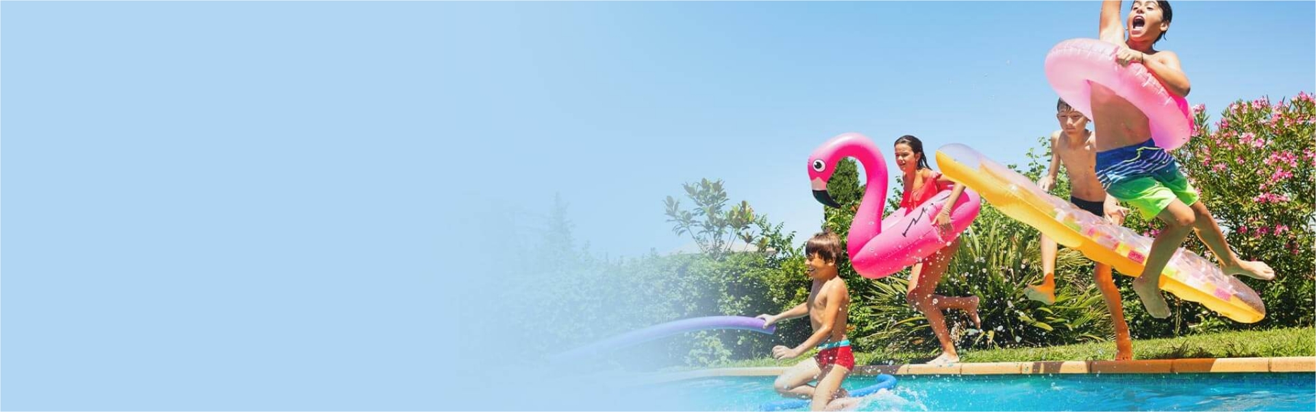 Group of kids jumping into the pool