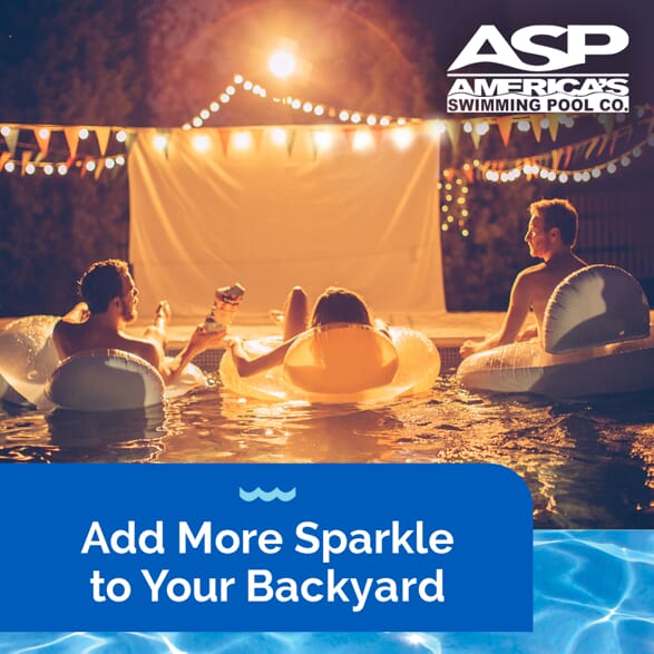 People swimming with pool lighting