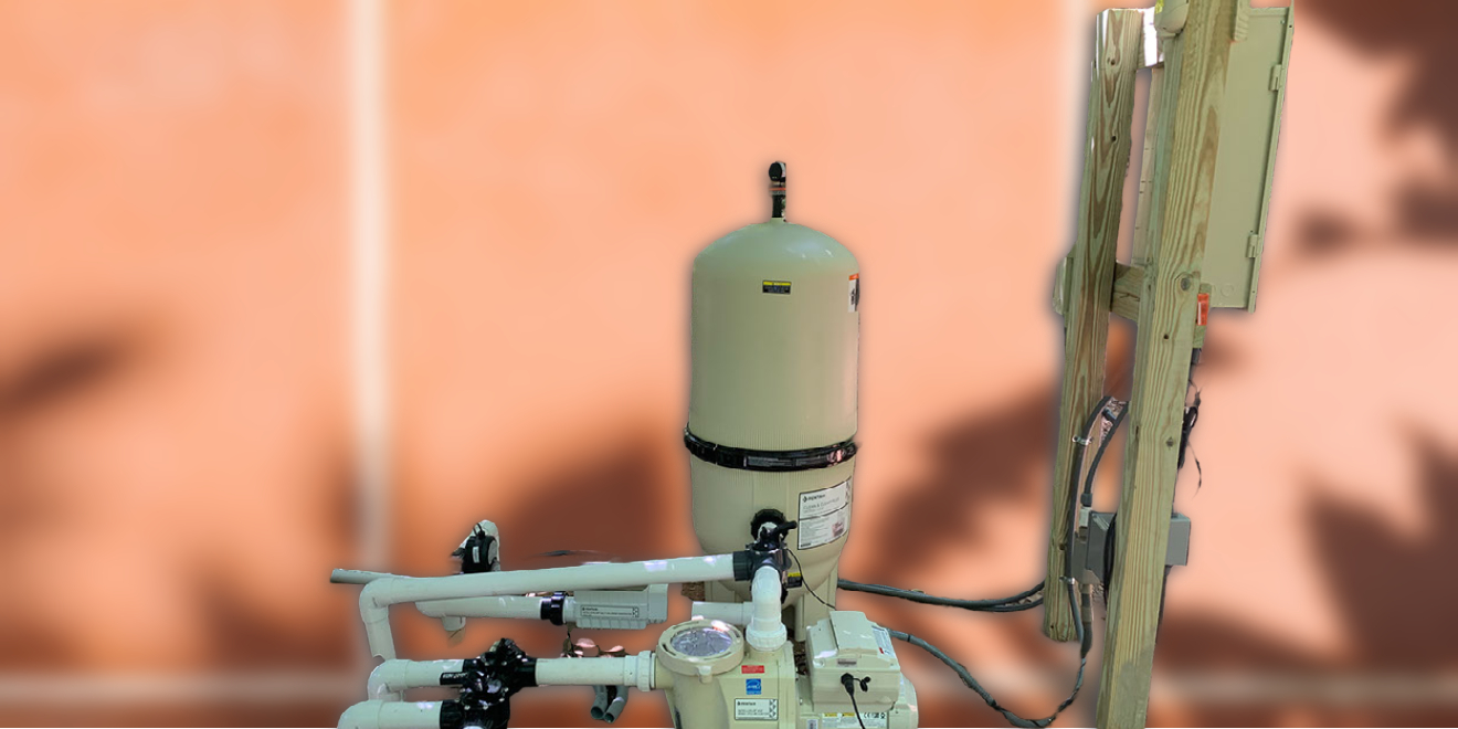 Backyard Pool Filter Equipment with Pool Tile Background