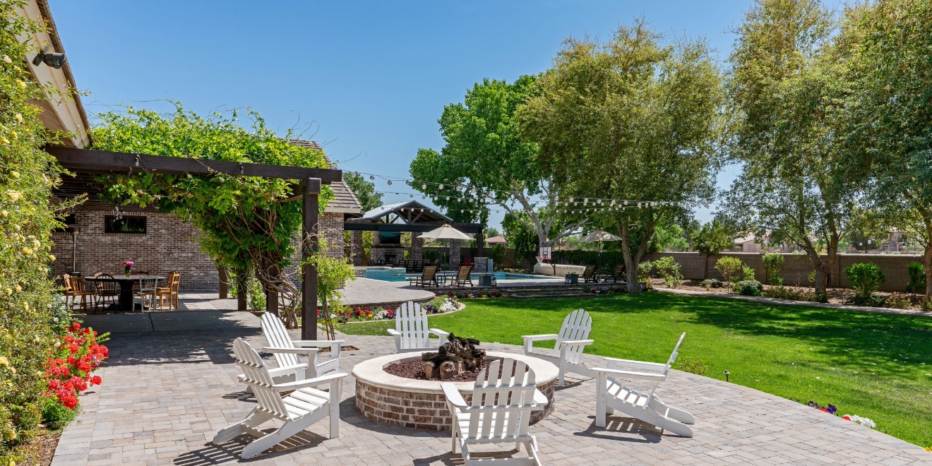 Backyard oasis with firepit and pool