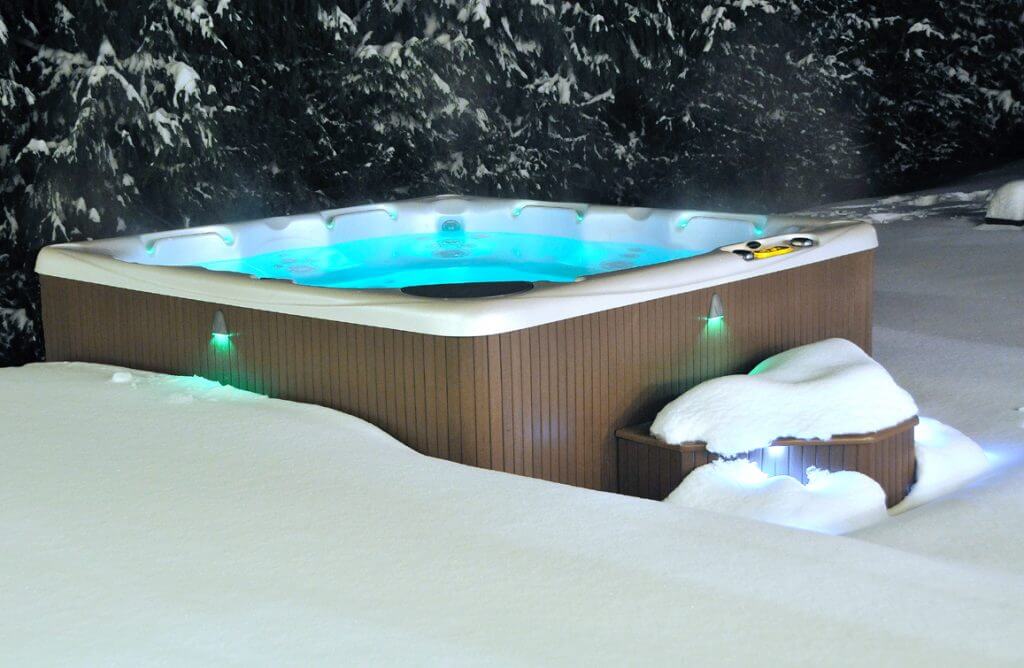 Hot tub surrounded by snow