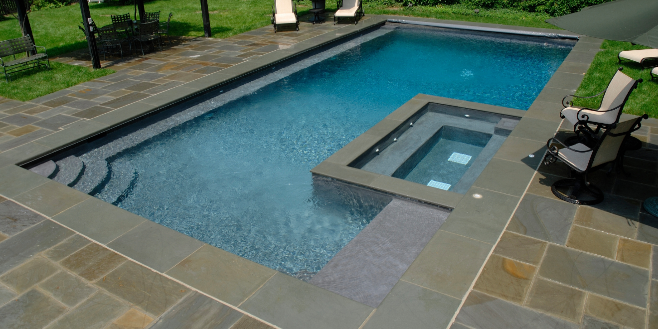 What Are the Different Types of Pool Deck Surfaces?