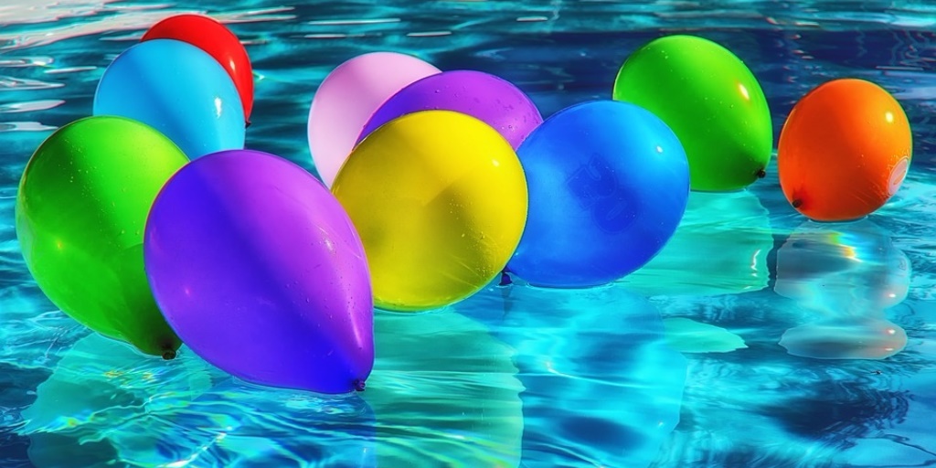 Balloons on water surface